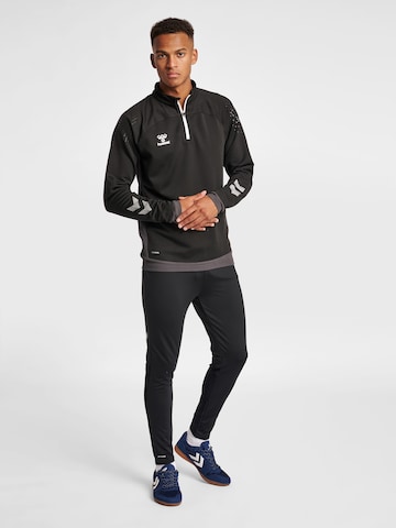 Coupe slim Pantalon de sport Hummel en noir