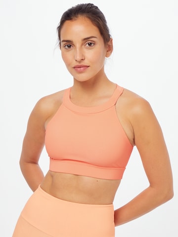 Onzie Sporttop in Orange: predná strana