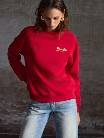 Sweat-shirt Grimelange en rouge : devant