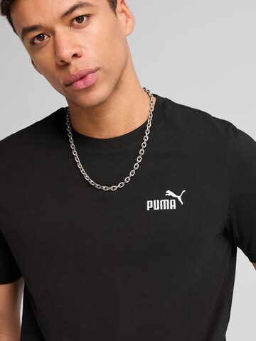 PUMA Функциональная футболка 'ESS No. 1' в Черный