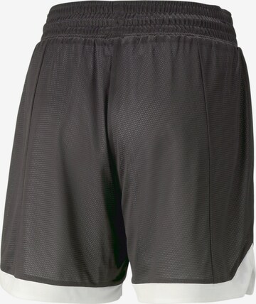 Regular Pantaloni sport de la PUMA pe negru