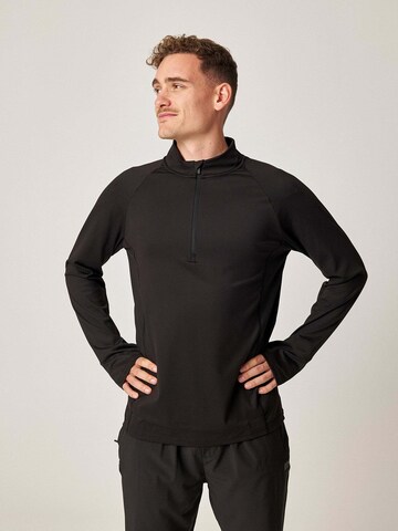 SNOCKS Sportsweatshirt in Zwart