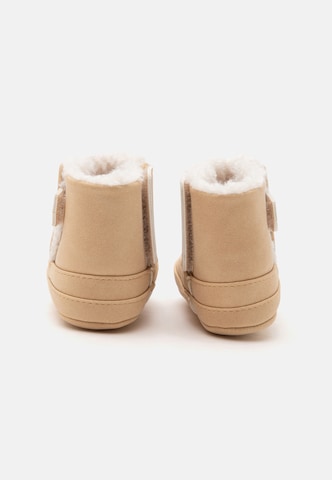 Nou-născuți 'KIKI' de la TOMMY HILFIGER pe bej
