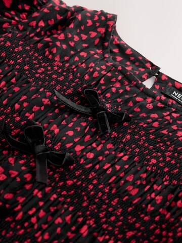 Next - Vestido en rojo