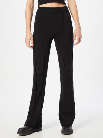 Han Kjøbenhavn Flared Trousers in Black: front