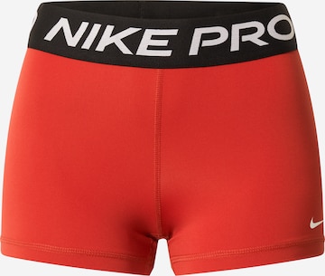 Pantaloni sport 'Pro' de la NIKE pe roșu: față