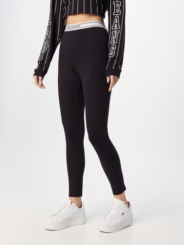 Tommy Jeans Skinny Leggings in Schwarz: predná strana