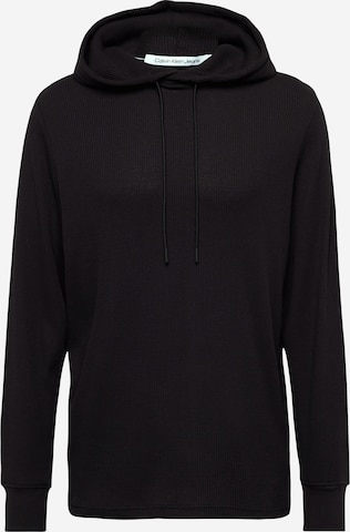 Sweat-shirt Calvin Klein Jeans en noir : devant