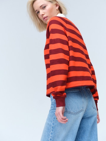 Next Sweater in Orange