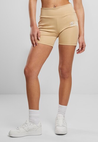 Skinny Pantalon de sport Karl Kani en beige