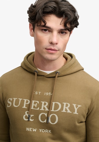 Superdry & Co Collegepaita '1954 Company' värissä ruskea