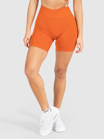 Smilodox Skinny Workout Pants 'Amaze Pro' in Orange: front