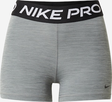 NIKE - Skinny Calças de desporto 'Pro' em cinzento: frente
