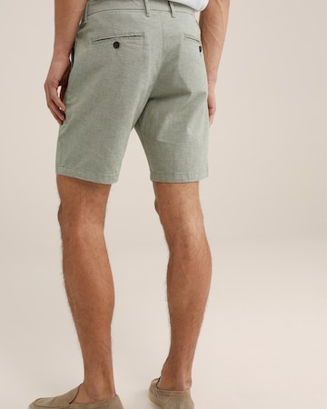 WE Fashion - Regular Calças chino em verde