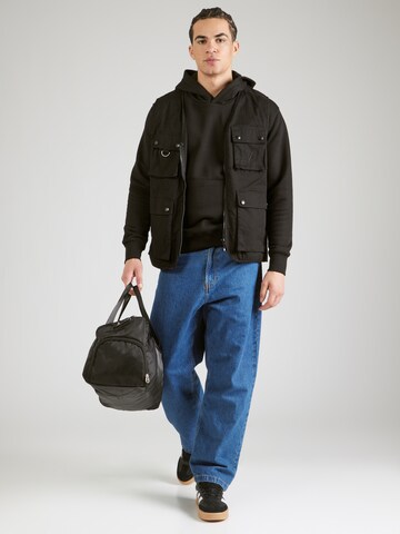 ALPHA INDUSTRIES Dressipluus 'Coach', värv must