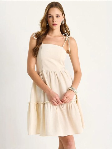 Bianco Lucci Summer Dress in Beige: front