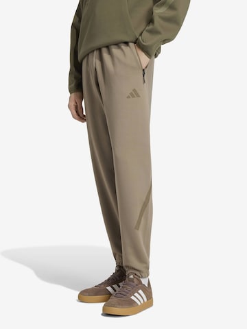 ruda ADIDAS SPORTSWEAR Siaurėjantis Sportinės kelnės 'Z.N.E.': priekis