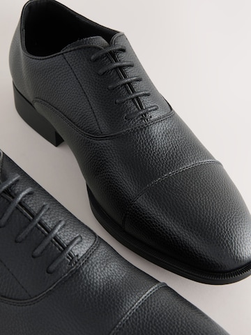 Chaussure à lacets Next en noir