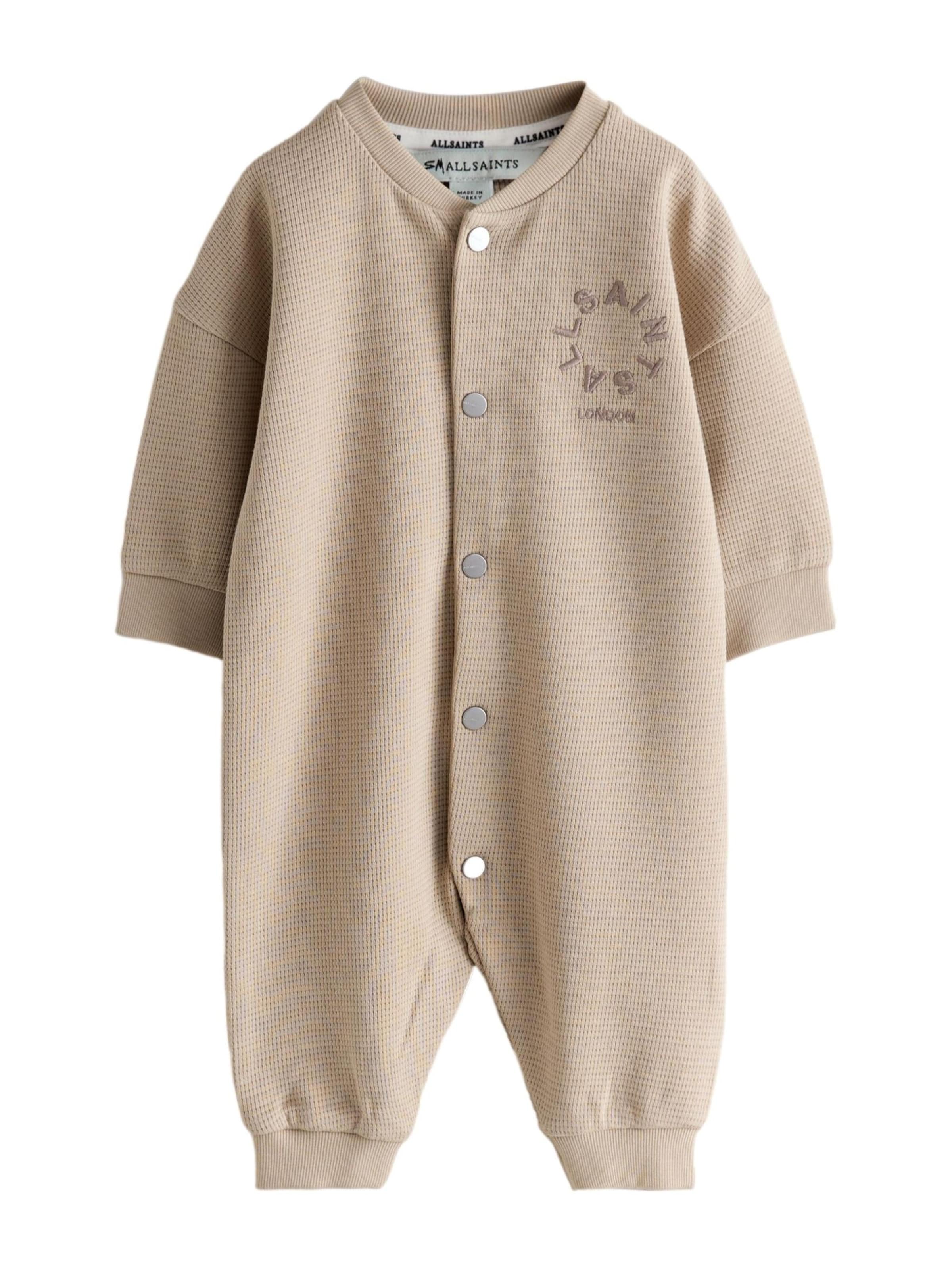 smALLSAINTS Strampler in Beige: Vorderseite