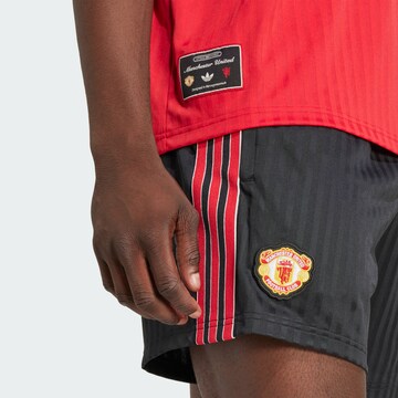 Loosefit Pantalon de sport 'Manchester United Terrace Icons' ADIDAS ORIGINALS en noir