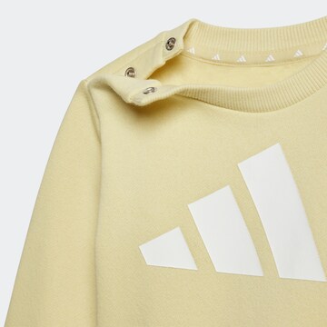 ADIDAS SPORTSWEAR Tracksuit 'Essentials' in Yellow