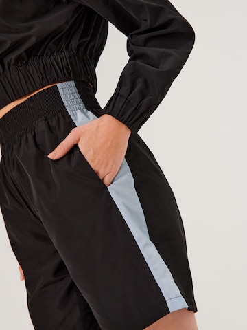 ABOUT YOU x Swalina&Linus Regular Pants 'Theresa' in Black