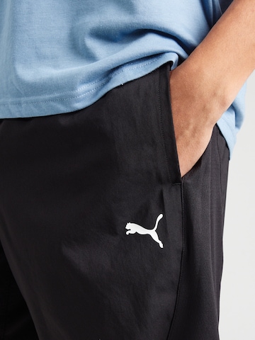 Regular Pantaloni sport 'Tad Tech' de la PUMA pe negru