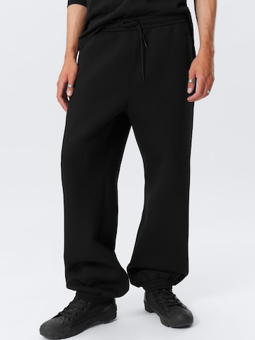 Tapered Pantaloni 'Simon' di WEEKDAY in nero: frontale