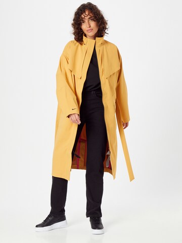 Nike Sportswear Between-Seasons Coat in Yellow