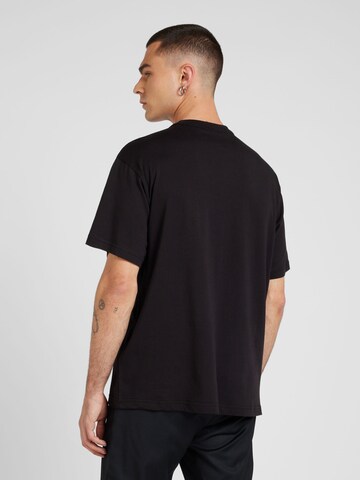 Tricou de la Versace Jeans Couture pe negru