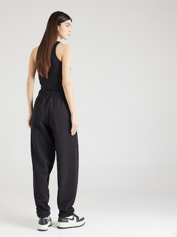 ALPHA INDUSTRIES Tapered Trousers 'Essentials' in Black