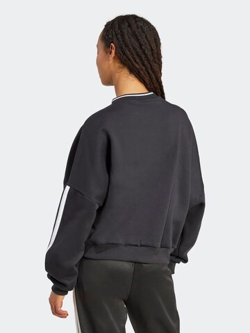 ADIDAS SPORTSWEAR Urheilullinen collegepaita 'TIRO' värissä musta