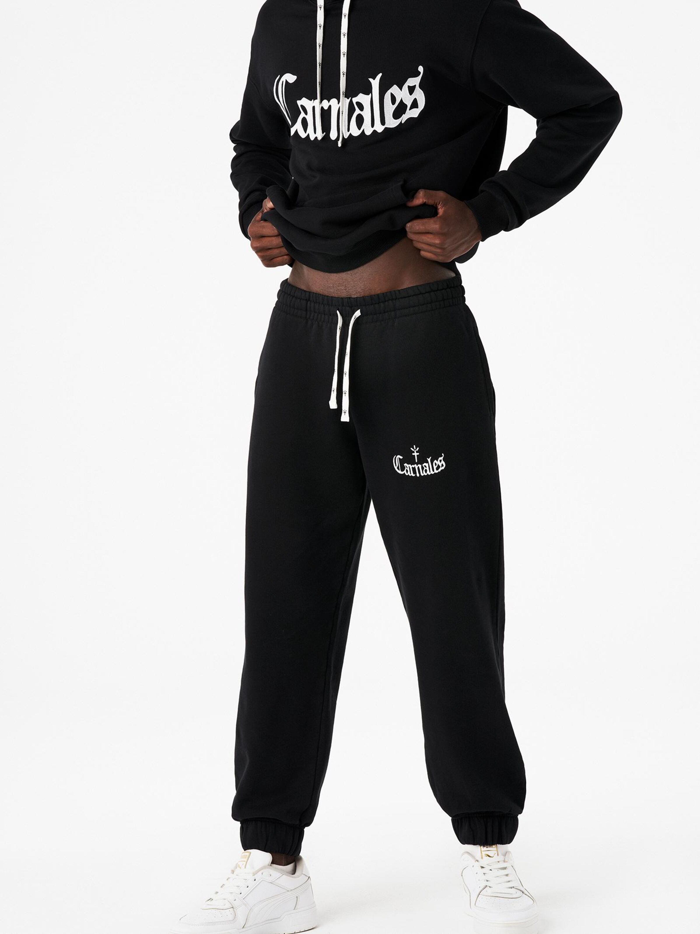 Carnales - Loosefit Pantalón 'Pantalón de chándal con logo bordado' en negro: frente