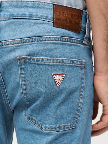 mėlyna GUESS JEANS Siauras Džinsai