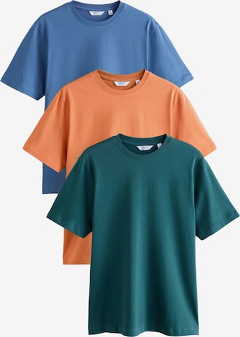 Next T-shirt i blå: framsida