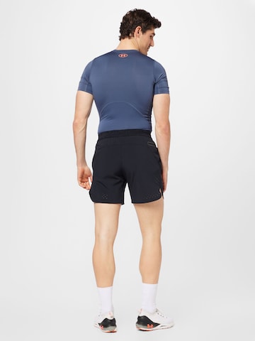 UNDER ARMOUR Regular Sportbroek 'Peak' in Zwart