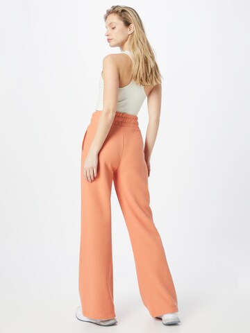 Wide Leg Pantalon 'Athletics Track' new balance en orange