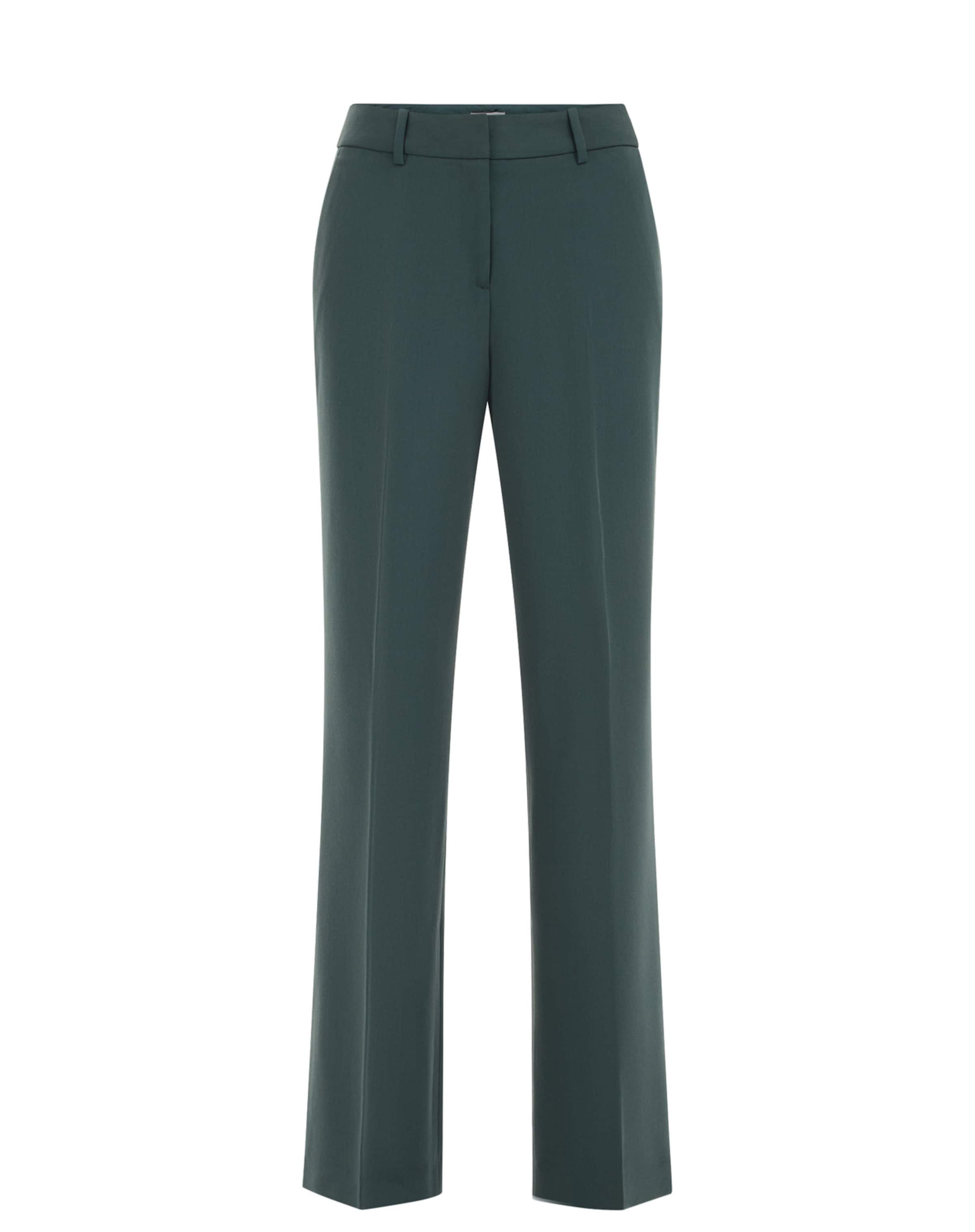 WE Fashion Wide leg Trousers with creases in Green: front