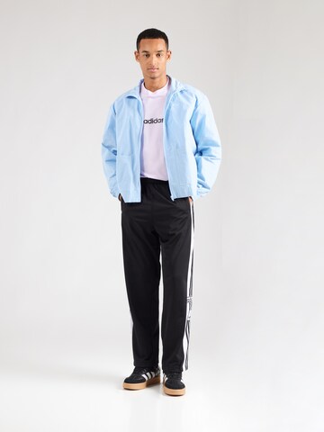 Giacca di mezza stagione 'ESS +' di ADIDAS ORIGINALS in blu