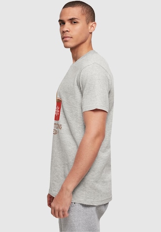 Merchcode T-Shirt 'Achtung Heiss' in Grau