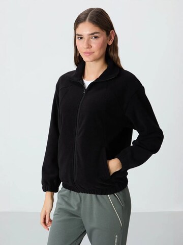 Tommy Life Bluzka sportowa w kolorze czarny