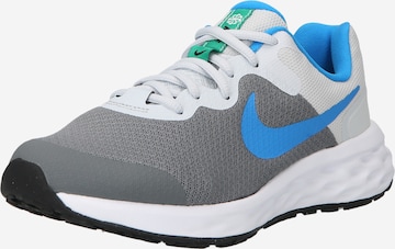 Chaussure de sport NIKE en gris : devant