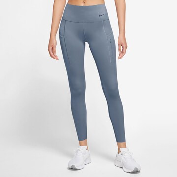 NIKE Skinny Workout Pants 'DF GO' in Purple: front
