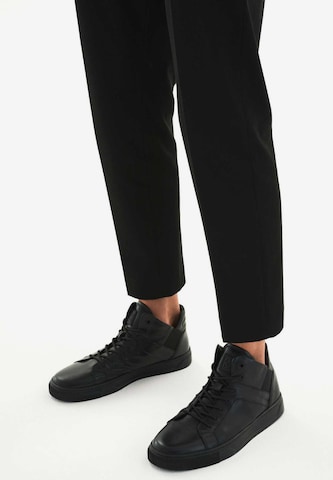 Kazar High-Top Sneakers in Black: front