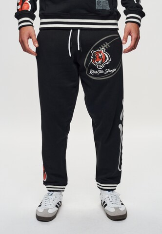 Recovered Regular Sportbroek 'NFL Bengals Rule The Jungle' in Zwart: voorkant