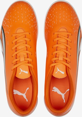 Chaussure de foot PUMA en orange