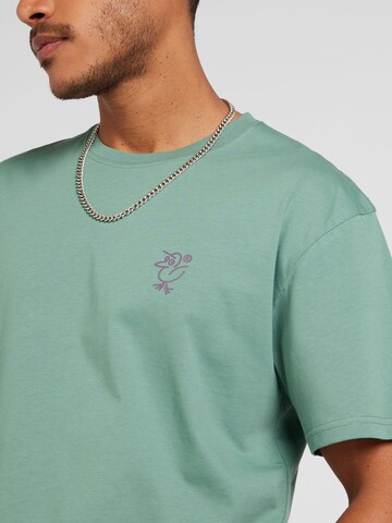 Maglietta 'Sketch Gull' di Cleptomanicx in verde