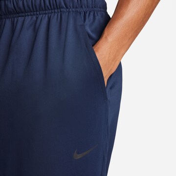 NIKE Regular Sports trousers 'TOTALITY' in Blue