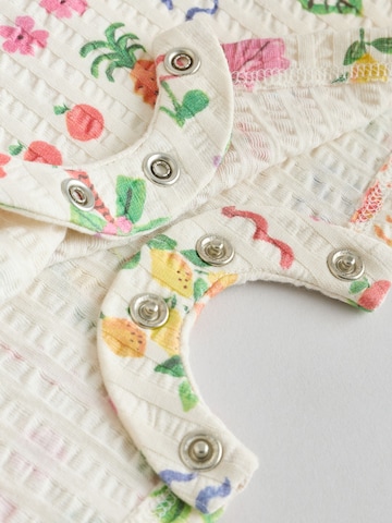 Ensemble Next en mélange de couleurs