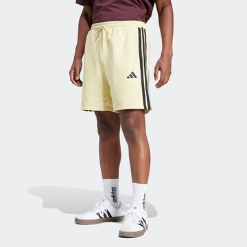 ADIDAS SPORTSWEAR Regular Sports trousers 'Essential' in Yellow: front